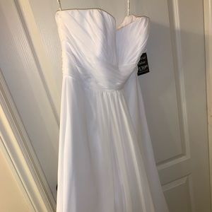 Never before worn white wedding gown